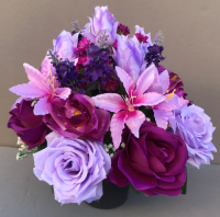 Pot for memorial vase with artificial purple  and lilac roses